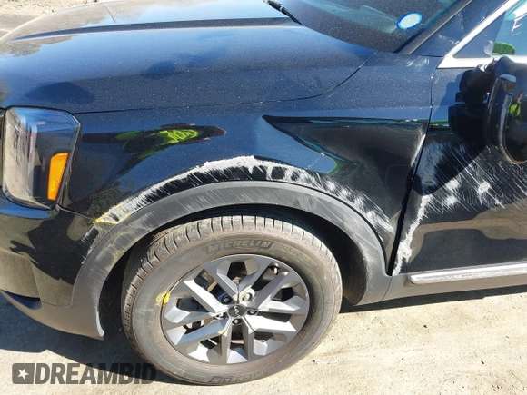2023 Kia Telluride LX z VIN 5XYP2DGC2PG394637, wystawiony jako IAAI lot #41697582 z przebiegiem 19 836 mil mil oraz . Historia ofert i sprzedaży dostępna na DreamBid. Obrazek 6.