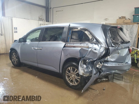 2013 Honda Odyssey EX-L with VIN 5FNRL5H64DB080141, listed as a Copart auction lot 49553235 with 128,358 mi miles and Salvage Title. Bid and sale history available at carsss.com. Image 2.