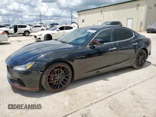2014 Maserati Ghibli S Q4 z VIN ZAM57RTA1E1085681, wystawiony jako Copart lot #55681055 z przebiegiem 72 526 mil mil oraz Szkody całkowita. Historia ofert i sprzedaży dostępna na DreamBid. Obrazek 1.