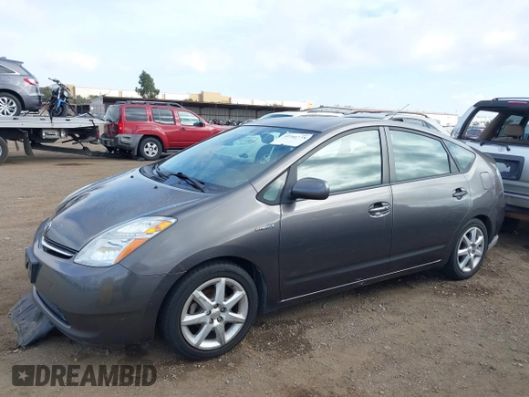 2009 Toyota Prius with VIN JTDKB20U293526367, listed as a IAAI auction lot 41709258 with 196,397 mi miles. Bid and sale history available at carsss.com. Image 6.