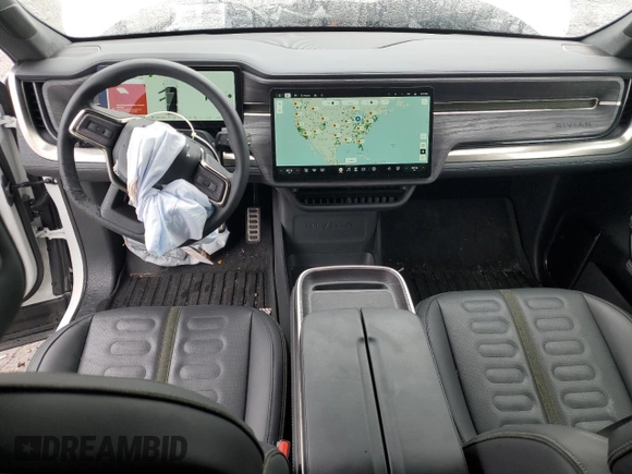 2023 Rivian R1S Adventure z VIN 7PDSGBBA2PN026420, wystawiony jako Copart lot #55331045 z przebiegiem 29 938 mil mil oraz Szkoda całkowita • Salvage title. Historia ofert i sprzedaży dostępna na DreamBid. Obrazek 8.