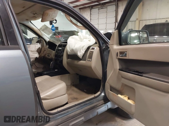 2010 Ford Escape Hybrid with VIN 1FMCU4K31AKC15842, listed as a IAAI auction lot 41332030 with 490,296 mi miles and . Bid and sale history available at DreamBid. Image 5.