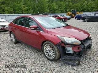 2014 Ford Focus Titanium with VIN 1FADP3J20EL352909, listed as a Copart auction lot 58501085 with 174,388 mi miles and Salvage title. Bid and sale history available at DreamBid. Image 4.