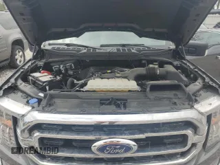 2023 Ford F-150 XL with VIN 1FTEW1EP8PKF20042, listed as a Copart auction lot 55163335 with 26,870 mi miles and Salvage title. Bid and sale history available at DreamBid. Image 11.