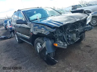 2009 Jeep Grand Cherokee Laredo with VIN 1J8GR48K99C550822, listed as a IAAI auction lot 41868508 with 179,436 mi miles. Bid and sale history available at carsss.com. Image 1.