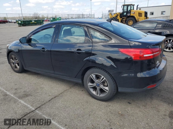 2018 Ford Focus SE with VIN 1FADP3FEXJL215912, listed as a Copart auction lot 50518385 with 100,080 mi miles and Salvage Title. Bid and sale history available at carsss.com. Image 2.