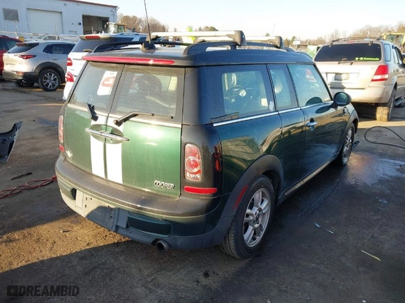 2013 MINI Cooper Clubman with VIN WMWZF3C57DT489934, listed as a IAAI auction lot 41290072 with 109,337 mi miles. Bid and sale history available at carsss.com. Image 4.