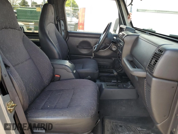 2002 Jeep Wrangler X with VIN 1J4FA39S32P708163, listed as a Copart auction lot 69703254 with 119,843 mi miles and Salvage Title. Bid and sale history available at carsss.com. Image 7.