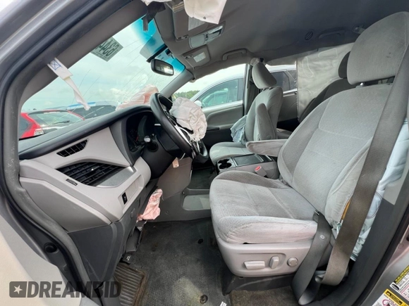 2015 Toyota Sienna LE with VIN 5TDJK3DC8FS104777, listed as a Copart auction lot 63440925 with 195,962 mi miles and Salvage title. Bid and sale history available at DreamBid. Image 7.