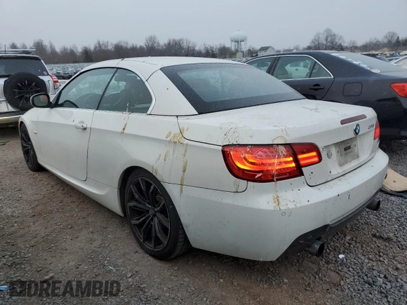 2013 BMW 3 Series 335i with VIN WBADX7C51DJ590221, listed as a Copart auction lot 88928575 with 98,558 mi miles and Salvage Title. Bid and sale history available at DreamBid. Image 2.