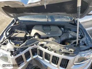 2015 Jeep Grand Cherokee Laredo with VIN 1C4RJFAG4FC675506, listed as a Copart auction lot 54562815 with 112,898 mi miles and Clean Title. Bid and sale history available at carsss.com. Image 12.