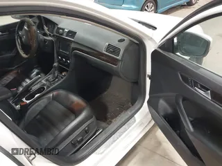2014 Volkswagen Passat SEL Premium with VIN 1VWCS7A36EC057394, listed as a IAAI auction lot 41254293 with 134,715 mi miles. Bid and sale history available at carsss.com. Image 5.
