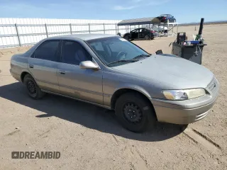 1999 Toyota Camry LE с VIN JT2BG22KXX0284593, выставлен на аукционе Copart как лот 54061685 с пробегом 229 047 миль миль и Списание • Salvage title. История ставок и продаж доступна на DreamBid. Изображение 4.