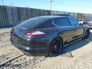 2010 Porsche Panamera S with VIN WP0AB2A71AL063114, listed as a IAAI auction lot 41169138 with 127,292 mi miles. Bid and sale history available at carsss.com. Image 4.