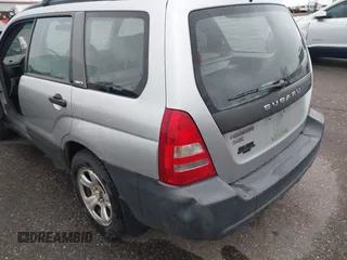 2003 Subaru Forester X with VIN JF1SG63633G728520, listed as a IAAI auction lot 41808658 with 104,084 mi miles. Bid and sale history available at carsss.com. Image 6.