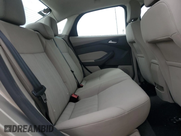 2016 Ford Focus SE z VIN 1FADP3F20GL267077, wystawiony jako Copart lot #53649665 z przebiegiem 106 329 mil mil oraz Szkoda całkowita • Salvage title. Historia ofert i sprzedaży dostępna na DreamBid. Obrazek 10.