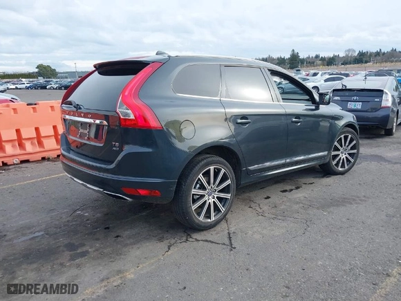 2015 Volvo XC60 T5 with VIN YV4612RK4F2633344, listed as a IAAI auction lot 41504235 with NaN miles. Bid and sale history available at carsss.com. Image 4.