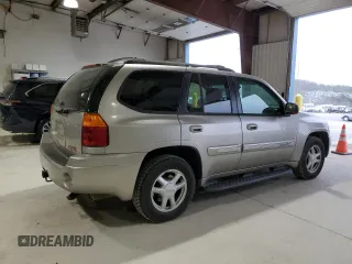 2003 GMC Envoy SLE z VIN 1GKDT13S432136642, wystawiony jako Copart lot #53467095 z przebiegiem 98 832 mil mil oraz Szkoda całkowita • Salvage title. Historia ofert i sprzedaży dostępna na DreamBid. Obrazek 3.