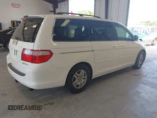 2005 Honda Odyssey EX with VIN 5FNRL38415B010150, listed as a IAAI auction lot 42844859 with 174,421 mi miles and . Bid and sale history available at DreamBid. Image 4.
