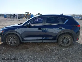 2017 Mazda CX-5 Touring with VIN JM3KFACL5H0180243, listed as a IAAI auction lot 41990818 with 158,977 mi miles. Bid and sale history available at carsss.com. Image 14.