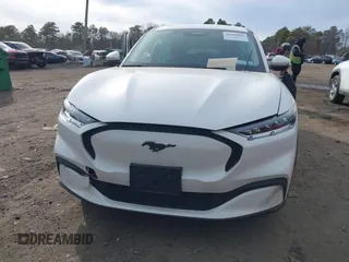 2022 Ford Mustang Mach-E Select z VIN 3FMTK1SS4NMA16858, wystawiony jako IAAI lot #41609839 z przebiegiem 46 462 mil mil oraz . Historia ofert i sprzedaży dostępna na DreamBid. Obrazek 12.