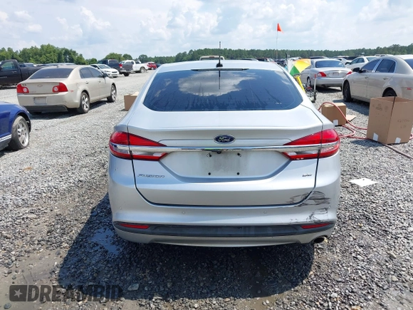 2017 Ford Fusion SE with VIN 3FA6P0H77HR164757, listed as a IAAI auction lot 42604366 with 182,532 mi miles and . Bid and sale history available at DreamBid. Image 16.
