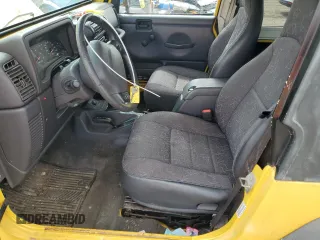 2001 Jeep Wrangler Sport z VIN 1J4FA49S01P355451, wystawiony jako Copart lot #56501545 z przebiegiem 213 027 mil mil oraz Czysty tytuł • Clean title. Historia ofert i sprzedaży dostępna na DreamBid. Obrazek 7.