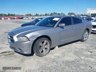 2014 Dodge Charger SXT with VIN 2C3CDXHG6EH166994, listed as a IAAI auction lot 41801739 with 163,314 mi miles. Bid and sale history available at carsss.com. Image 2.