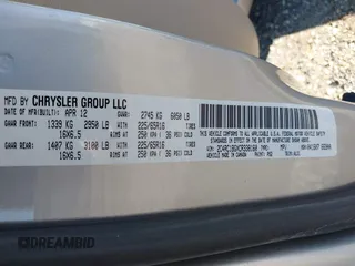 2012 Chrysler Town & Country Touring with VIN 2C4RC1BGXCR338160, listed as a IAAI auction lot 41042918 with 214,961 mi miles and . Bid and sale history available at DreamBid. Image 9.