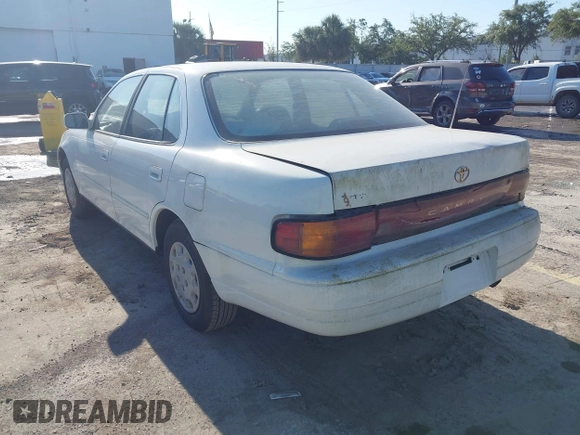 1993 Toyota Camry LE with VIN 4T1SK12E6PU316163, listed as a IAAI auction lot 42046444 with 261,514 mi miles. Bid and sale history available at carsss.com. Image 3.