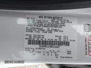 2011 Ford Fusion Hybrid with VIN 3FADP0L31BR316647, listed as a IAAI auction lot 41730126 with 162,354 mi miles. Bid and sale history available at carsss.com. Image 9.