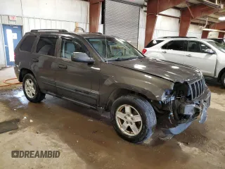 2005 Jeep Grand Cherokee Laredo with VIN 1J4GR48K85C722110, listed as a Copart auction lot 54735605 with 199,609 mi miles and Clean title. Bid and sale history available at DreamBid. Image 4.