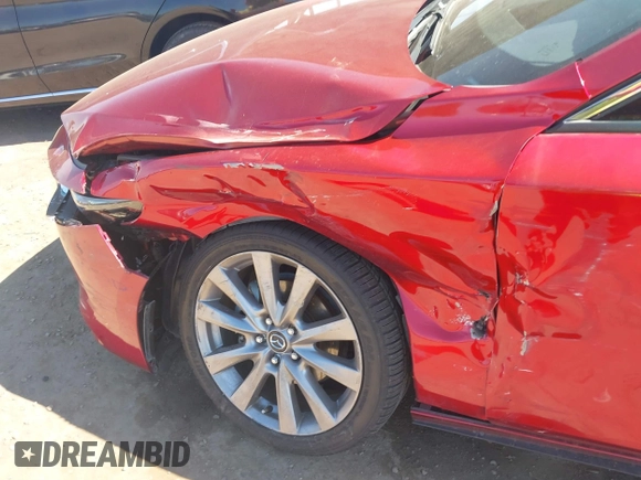 2019 Mazda 3 Premium with VIN JM1BPBEM7K1119186, listed as a IAAI auction lot 41862021 with 39,248 mi miles and . Bid and sale history available at DreamBid. Image 6.