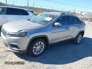 2019 Jeep Cherokee Latitude with VIN 1C4PJLCB4KD428000, listed as a IAAI auction lot 40602703 with 232,159 mi miles and . Bid and sale history available at DreamBid. Image 2.