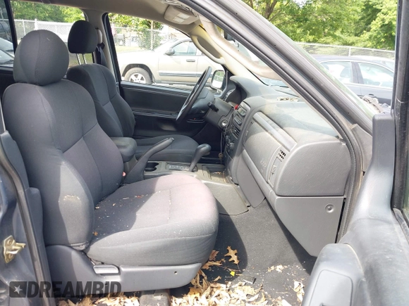 2002 Jeep Grand Cherokee Laredo with VIN 1J4GW48S92C150162, listed as a IAAI auction lot 42471732 with 171,677 mi miles and . Bid and sale history available at DreamBid. Image 5.