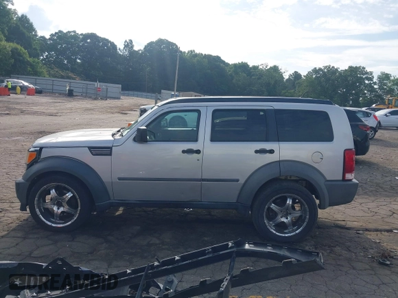 2007 Dodge Nitro SXT with VIN 1D8GU28K37W562598, listed as a IAAI auction lot 42491176 with 202,676 mi miles and . Bid and sale history available at DreamBid. Image 14.