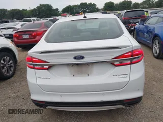 2017 Ford Fusion Titanium z VIN 3FA6P0K96HR124146, wystawiony jako IAAI lot #42428041 z przebiegiem 204 306 mil mil oraz . Historia ofert i sprzedaży dostępna na DreamBid. Obrazek 16.