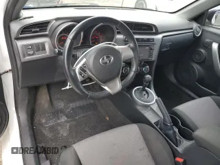 2014 Scion tC z VIN JTKJF5C70E3084411, wystawiony jako Copart lot #54255385 z przebiegiem 152 715 mil mil oraz Szkody całkowita. Historia ofert i sprzedaży dostępna na DreamBid. Obrazek 8.