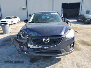 2014 Mazda CX-5 Grand Touring with VIN JM3KE2DY8E0361108, listed as a Copart auction lot 52876965 with 116,135 mi miles and Salvage Title. Bid and sale history available at carsss.com. Image 5.