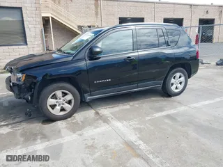 2014 Jeep Compass Sport with VIN 1C4NJCBA8ED504080, listed as a IAAI auction lot 41794638 with 82,138 mi miles. Bid and sale history available at carsss.com. Image 18.