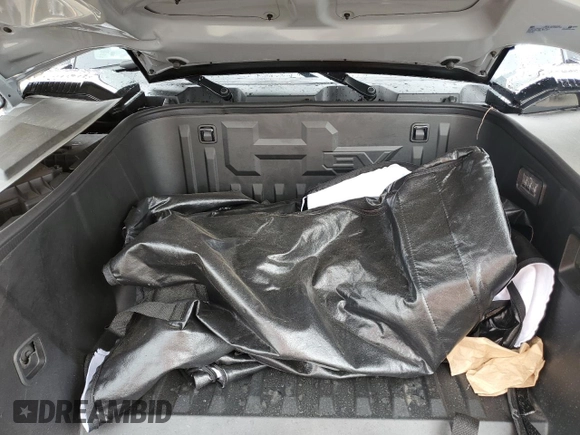 2024 GMC Hummer EV 2X z VIN 1GKB0NDE3RU110966, wystawiony jako Copart lot #79210474 z przebiegiem 3569 mil mil oraz Szkody całkowita. Historia ofert i sprzedaży dostępna na DreamBid. Obrazek 14.