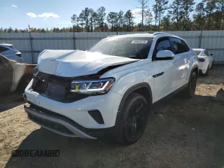 2023 Volkswagen Atlas SE z VIN 1V2WC2CA7PC212807, wystawiony jako Copart lot #78803313 z przebiegiem 8 806 mil mil oraz . Historia ofert i sprzedaży dostępna na DreamBid. Obrazek 1.
