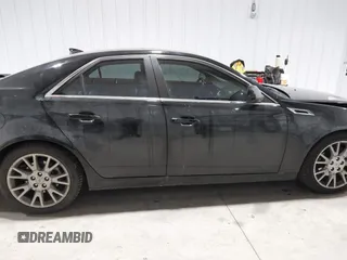 2013 Cadillac CTS Premium z VIN 1G6DS5E34D0103328, wystawiony jako IAAI lot #41501406 z przebiegiem 157 633 mil mil oraz . Historia ofert i sprzedaży dostępna na DreamBid. Obrazek 13.