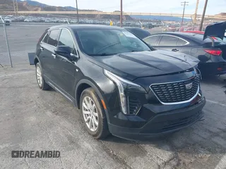 2022 Cadillac XT4 FWD Luxury with VIN 1GYAZAR43NF100453, listed as a IAAI auction lot 41182378 with 35,486 mi miles and . Bid and sale history available at carsss.com. Image 1.