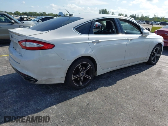 2014 Ford Fusion Titanium with VIN 3FA6P0K90ER172690, listed as a IAAI auction lot 42697162 with Not provided miles and . Bid and sale history available at DreamBid. Image 4.