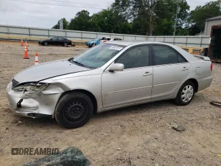 2004 Toyota Camry LE with VIN 4T1BE32K44U286892, listed as a Copart auction lot 60863975 with 207,205 mi miles and Salvage title. Bid and sale history available at DreamBid. Image 1.