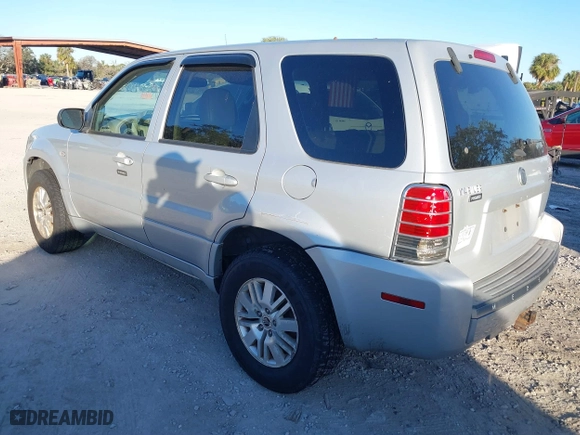 2005 Mercury Mariner Luxury with VIN 4M2CU57115DJ11387, listed as a IAAI auction lot 41267614 with 166,448 mi miles. Bid and sale history available at carsss.com. Image 3.