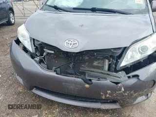 2014 Toyota Sienna XLE with VIN 5TDYK3DC4ES463315, listed as a IAAI auction lot 42108050 with 197,140 mi miles. Bid and sale history available at carsss.com. Image 6.