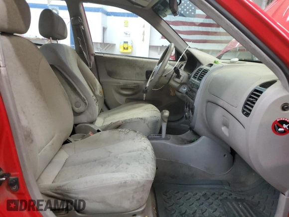 2005 Hyundai Accent GLS with VIN KMHCG45C05U661607, listed as a Copart auction lot 71812814 with 238,630 mi miles and Salvage Title. Bid and sale history available at carsss.com. Image 7.