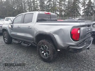 2024 GMC Canyon 4WD AT4X with VIN 1GTP6EEK9R1163595, listed as a IAAI auction lot 41568532 with 5,742 mi miles. Bid and sale history available at carsss.com. Image 3.